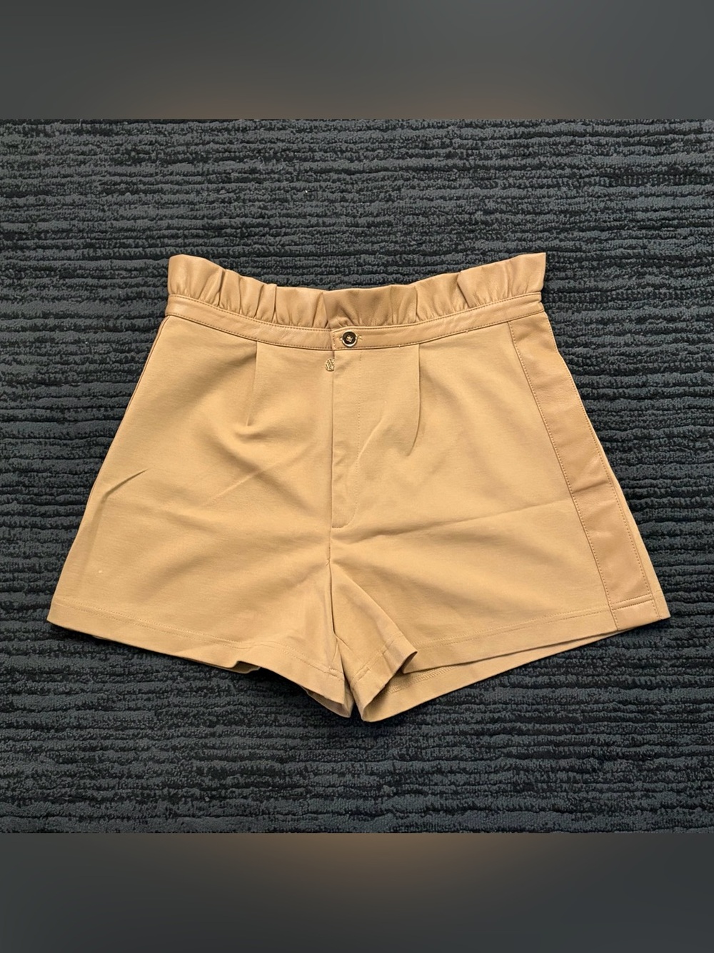 Emily McCarthy paper bag waist high rise faux leather trim ruffle shorts